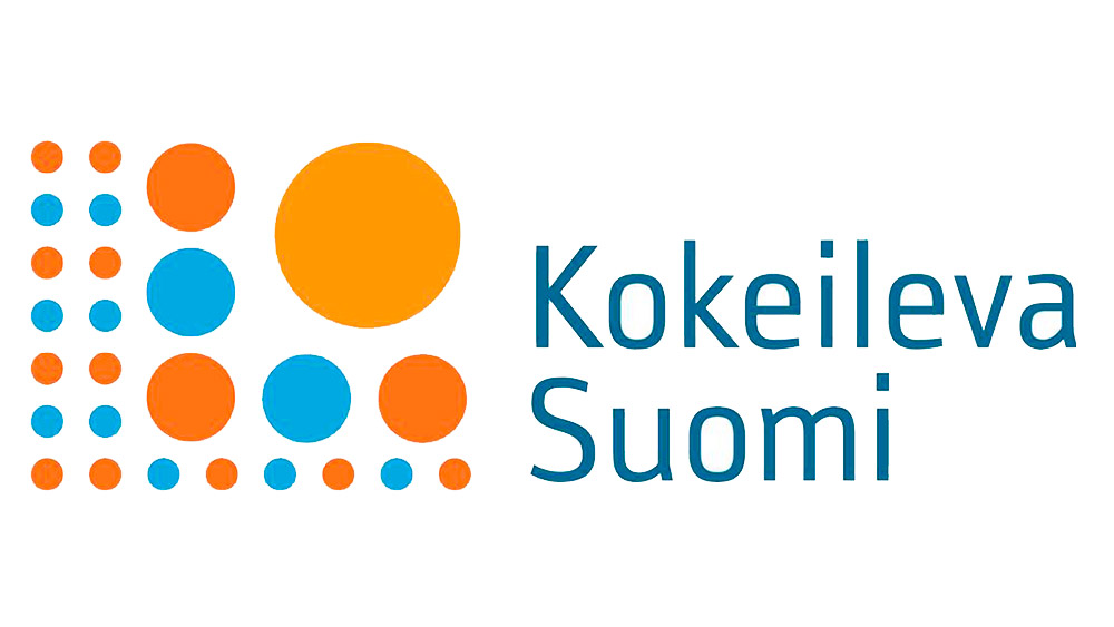 Kokeileva Suomi -logo, jossa erivärisiä ja -kokoisia palloja sekä teksti 
