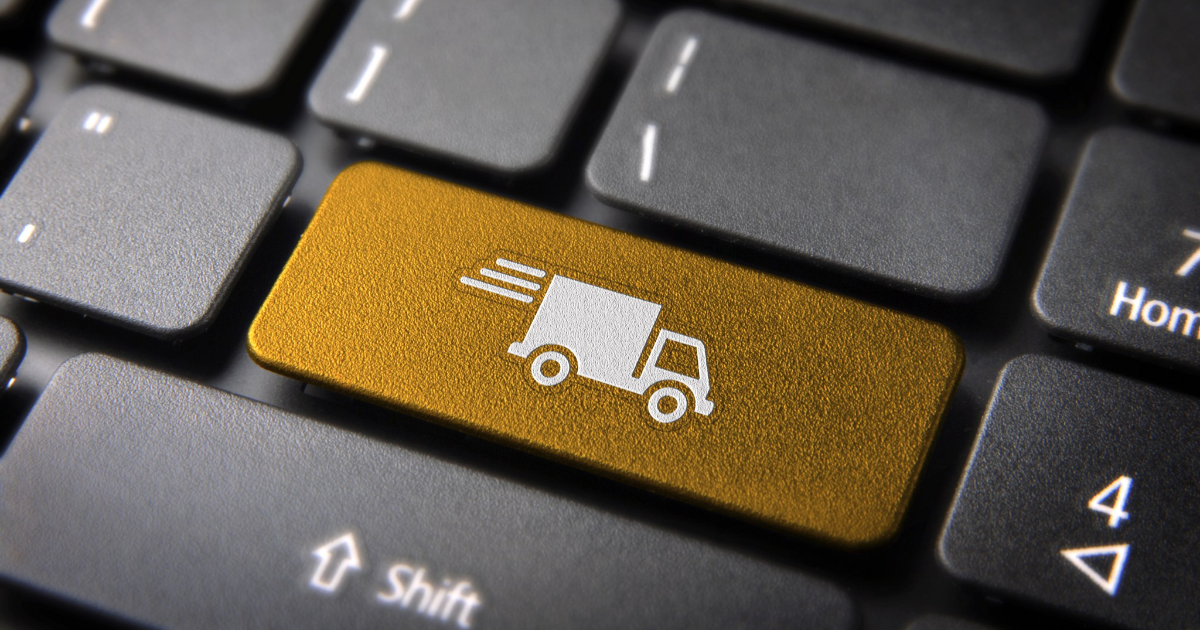 Tietokoneen näppäin, jossa kuorma-autoikoni. (Kuva: Shutterstock)