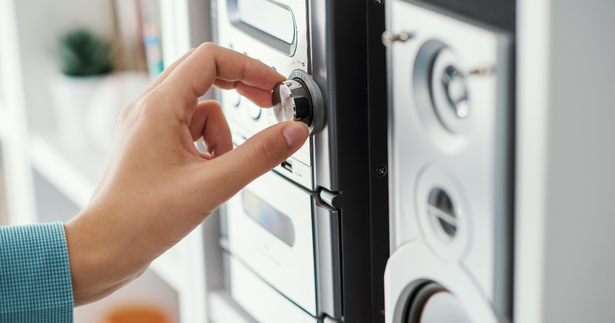 Person using a radio. (Image: Shutterstock)