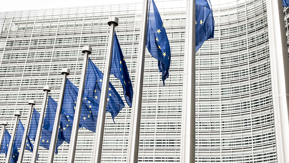 Berlaymont building witn manuy EU flags