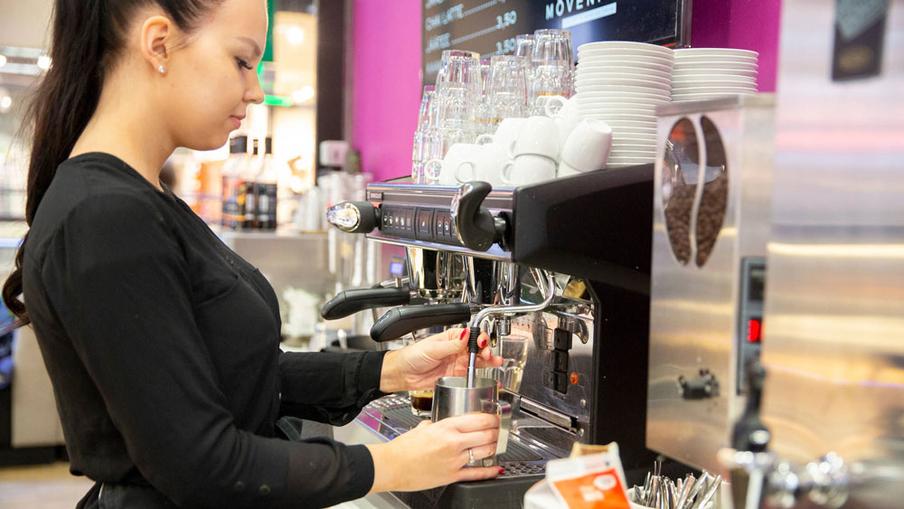 A young cafeteria worker