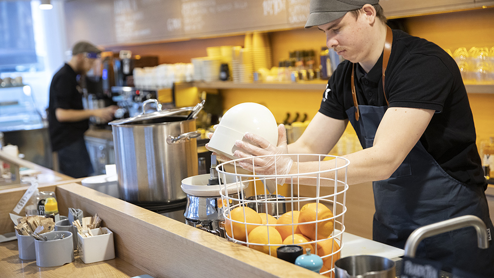 Arbetstagare på ett kafé