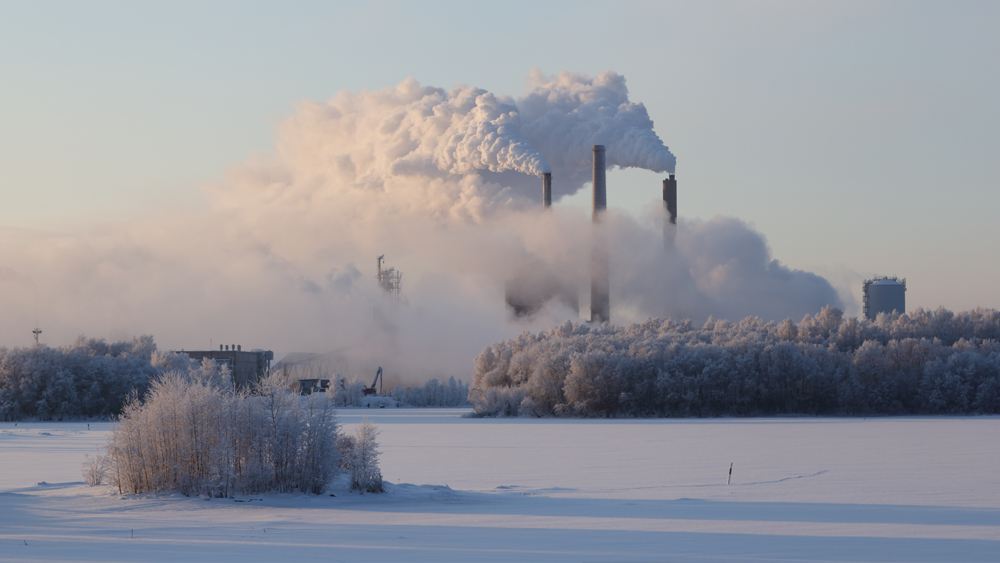 Factory smokestacks on a winter day