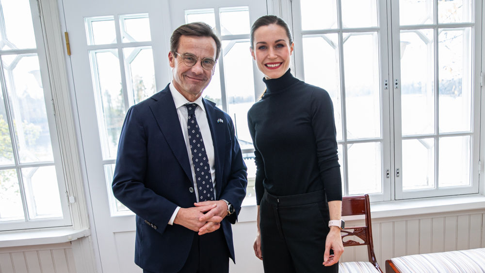 Prime Ministers Kristersson and Marin standing side by side