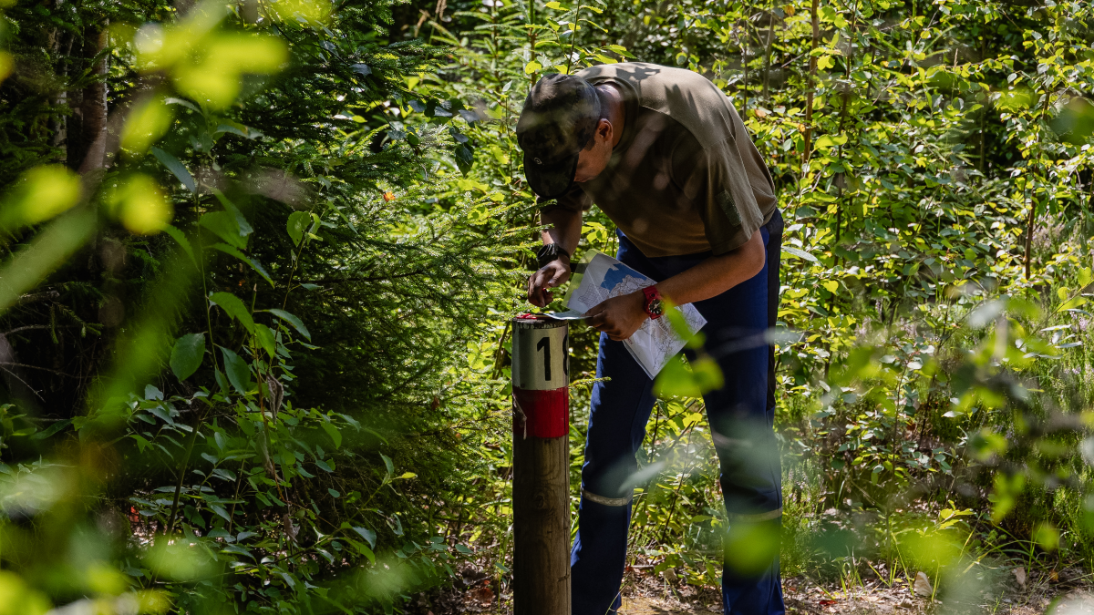 Soldier orienteering in a forrest.