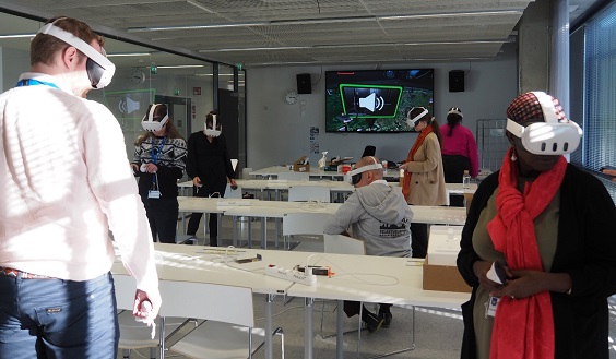 Participants in class using virtual reality goggles